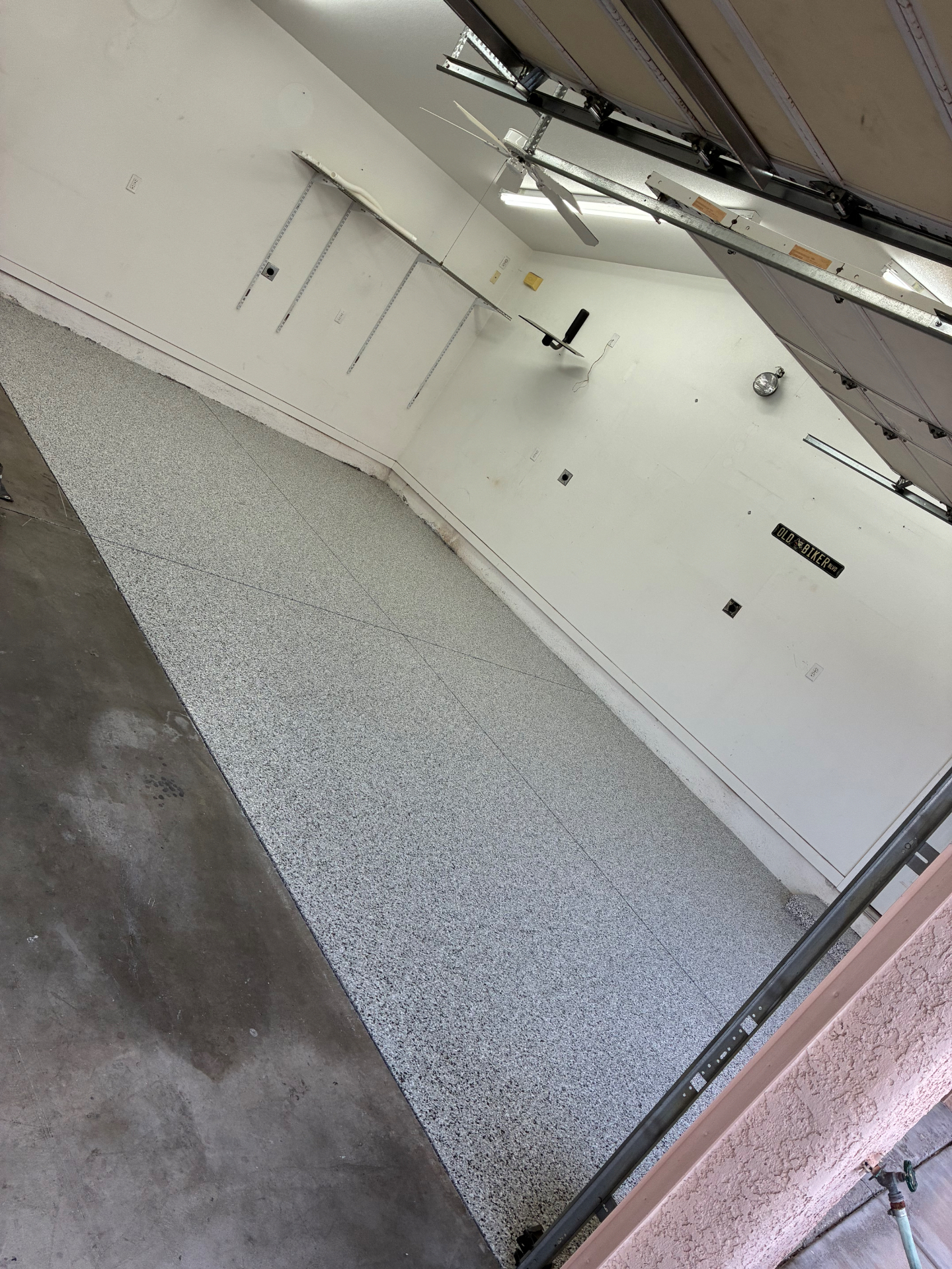 Flake Garage & Entry Transition — Speckled flake broadcast with clear topcoat