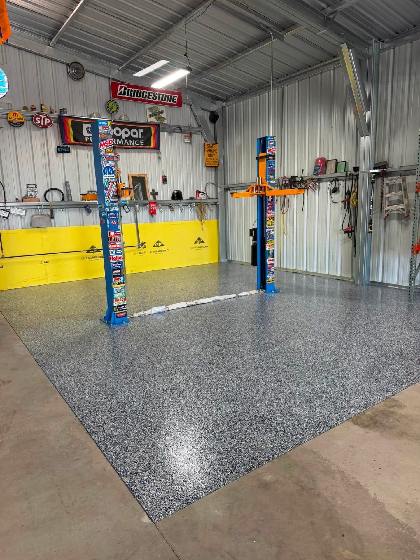 Performance Shop Flake Floor after — finished Prestige epoxy surface